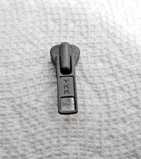 One Gray #5V YKK slider for Vislon (molded plastic) zipper