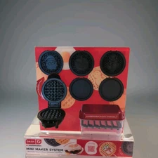 Dash Mini Waffle Maker with 6 Removable( 1 missing) Plates and Storage Case used