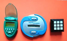 3 Vintage Electronic Handheld Games - Rubik's Slide, Catch Phrase, and Blackjack