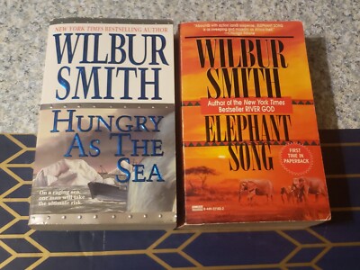 WILBUR SMITH - LOT OF 2 PAPERBACK BOOKS - HUNGRY AS THE SEA & ELEPHANT SONG -