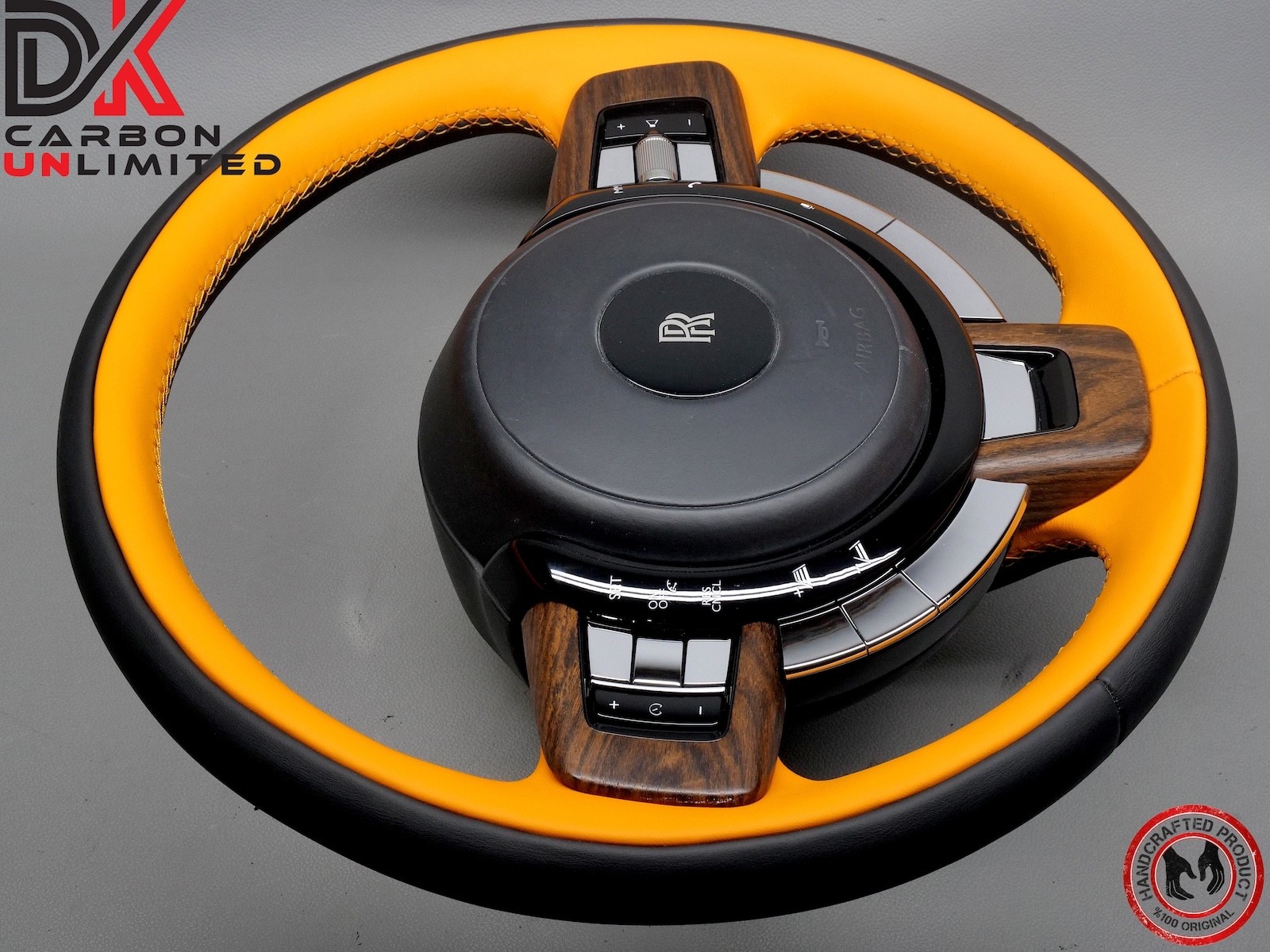 Rolls Royce Spectre Thick Rimmed Two Tone Black & Mandarin Stitch Steering Wheel