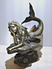Mermaid lies on Rock - Tail arched in a graceful curve - Resin & Bronze Finish 