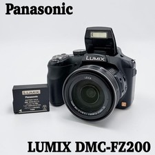 Panasonic LUMIX DMC-FZ200 fotocamera digitale testata con accessori e piccoli segni di usura