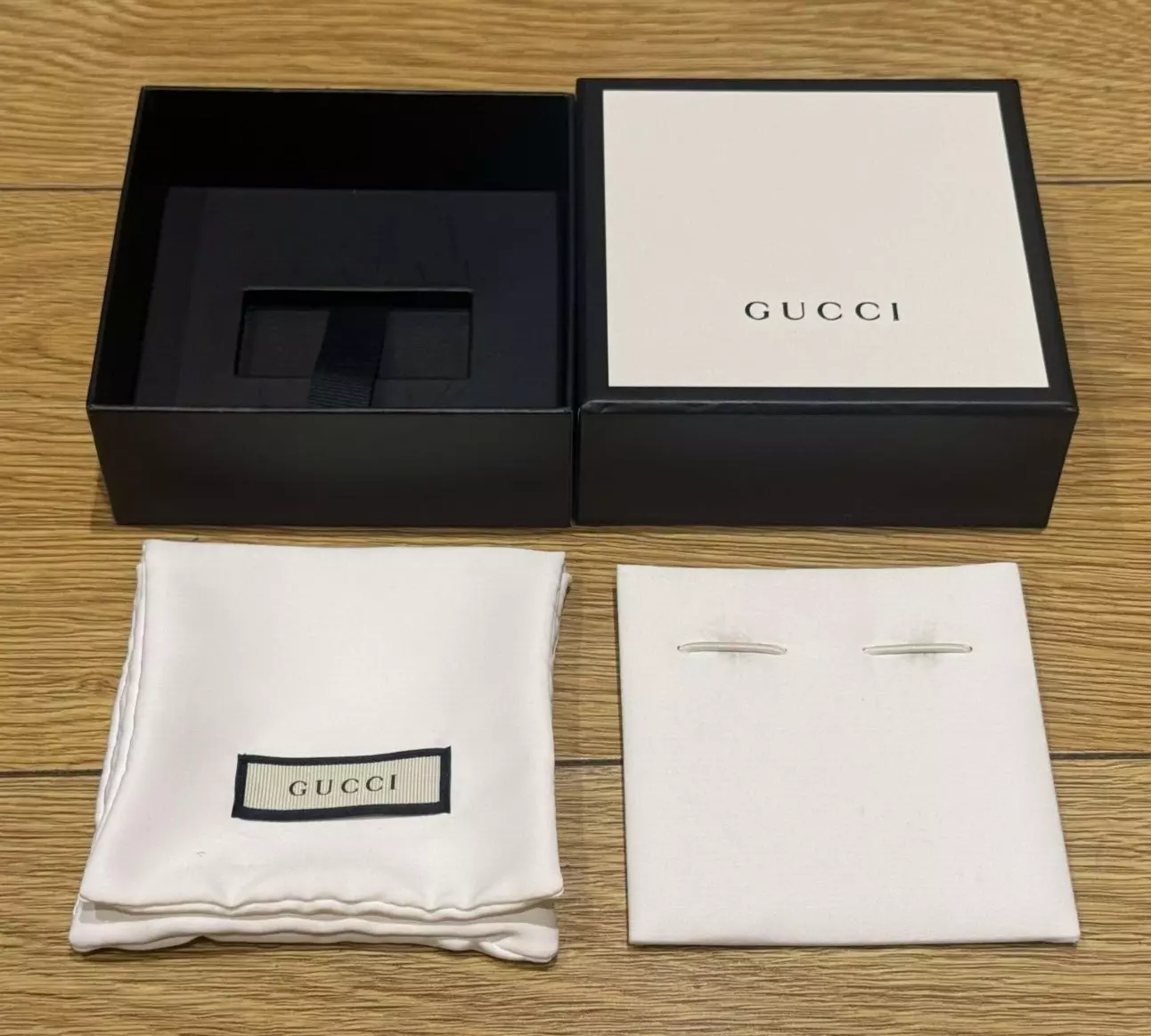 Véritable boîte collier pendentif bijoux Gucci noir et blanc avec pochette + plateau