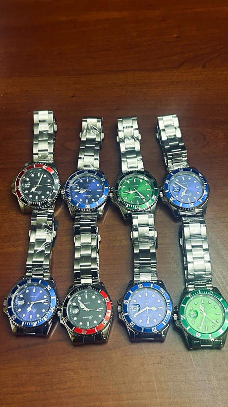 New old stock Gonewa Quartz Analog Date 12-Hour Bezel Silver Metal Bracelet