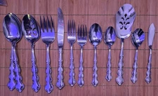 8 PLACE SETTINGS ONEIDA DELUXE STAINLESS MOZART FLATWARE + SEVEN SERVING PIECES