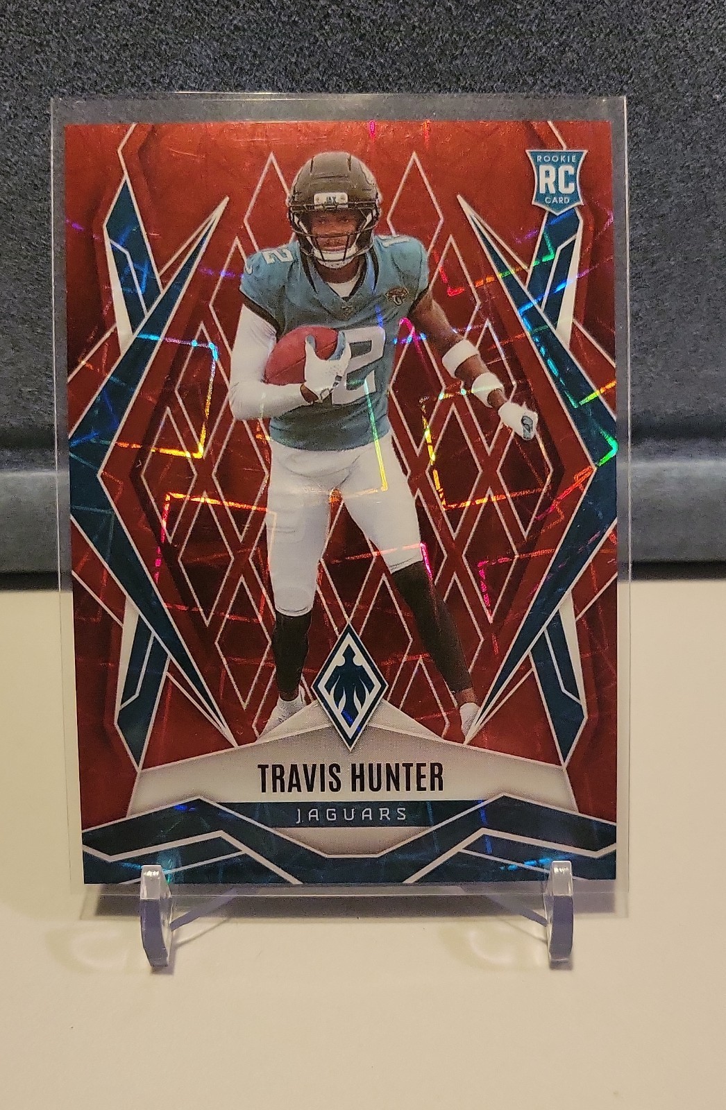 2025 Panini Phoenix - Rookies Travis Hunter #157 Red Lazer /199 (RC)