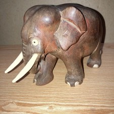 Small Heavy Hardwood Elephant With Bone Tusks , Eyes And Toes.