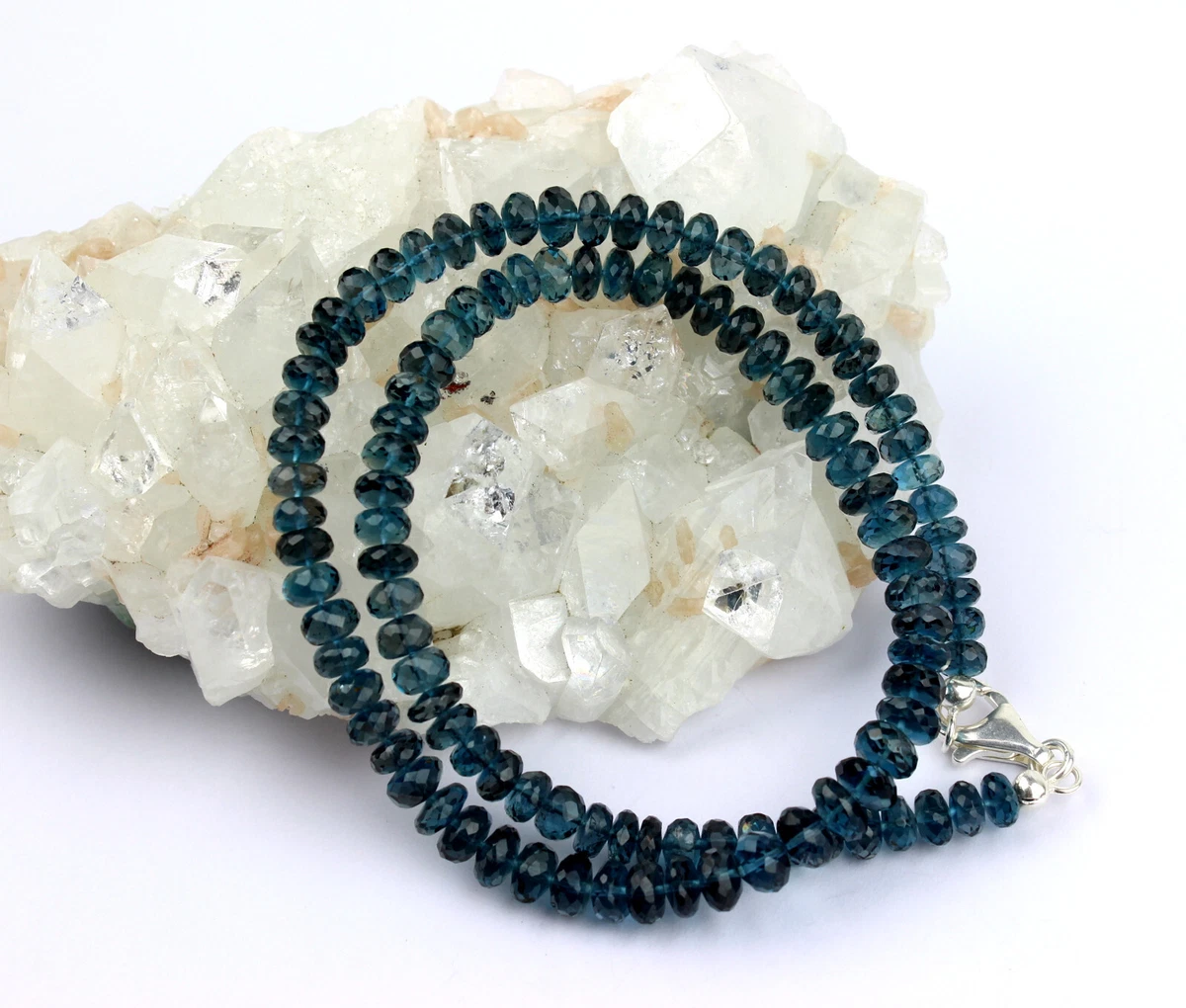Collana in argento con spinello e topazio blu svizzero