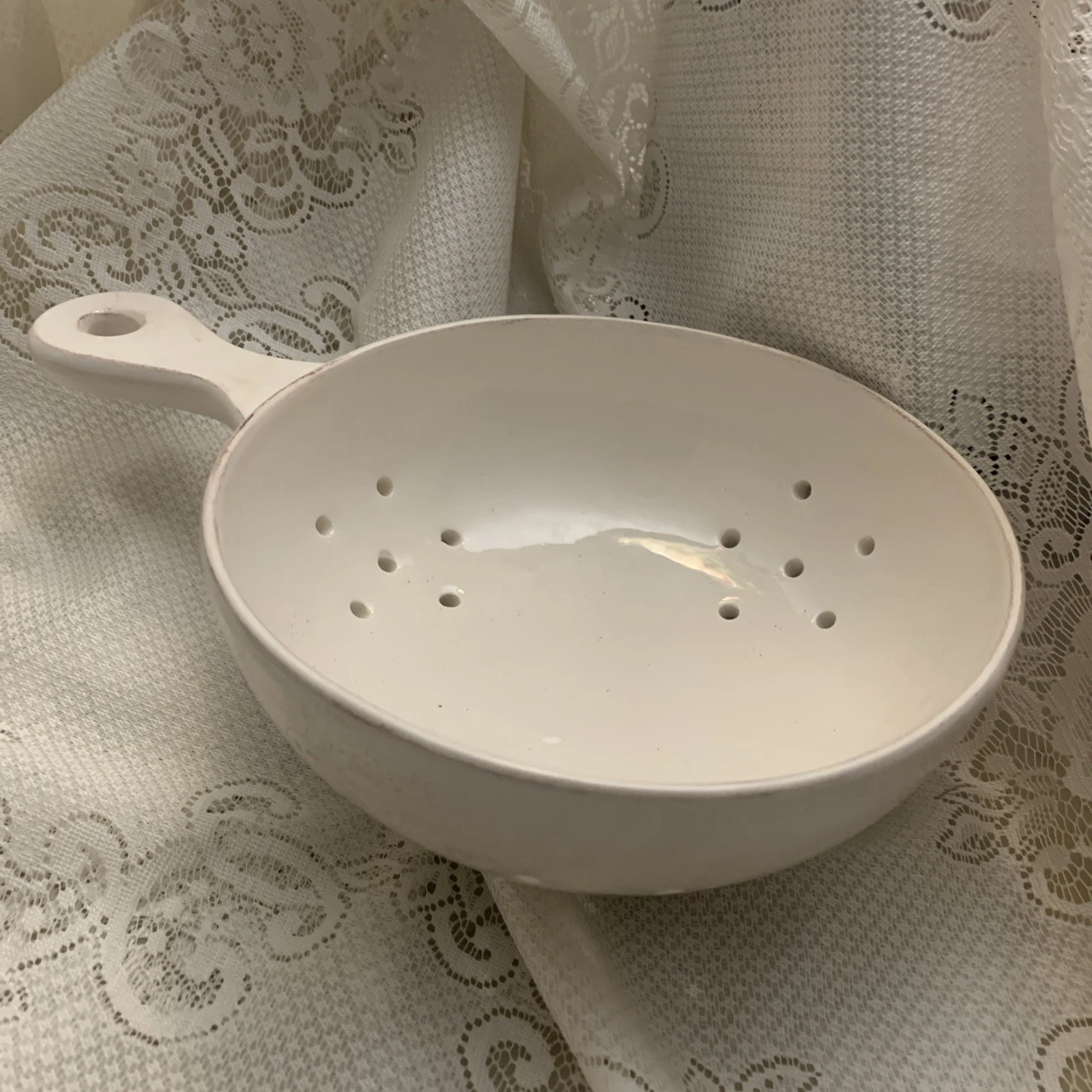 World Market ceramic berry colander w/handle footed
