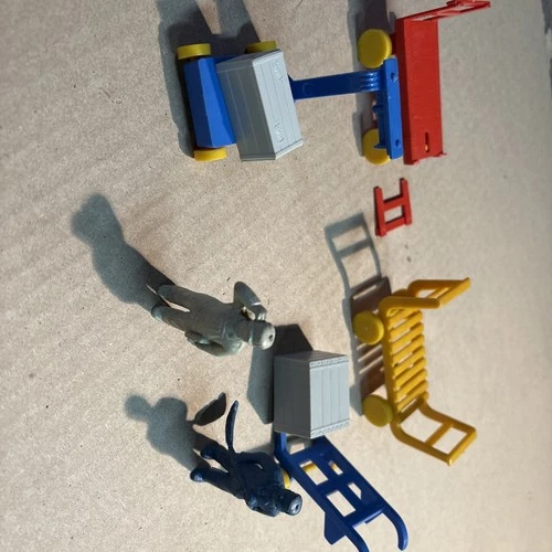 Marx plastic freight station, accessories, lot of eight pieces