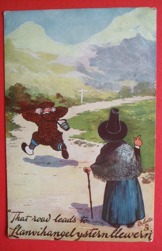 1913 WALES Comic WALISISCHE DAME RICHTUNGEN LANGE ORTSNAMEN GIBT TOURISTEN OHRENSCHMERZEN