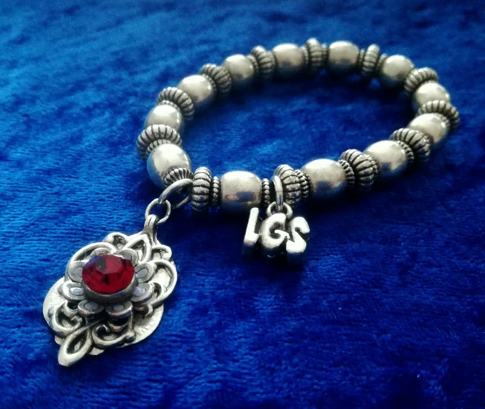 Bijou BRACELET LGS LES GENS DU SUD métal argenté breloque pierre rouge - Photo 4/4