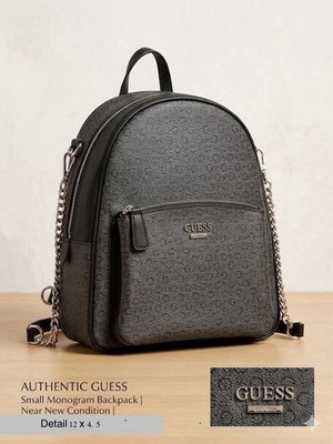 Guess women's mini backpack in a grey and black logo print Faux Leather