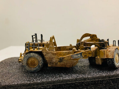ミニカー DM 1/50 CAT 657G WHEEL TRACTOR-SCRAPER Amazon.com: Caterpillar 657G Wheel Tractor Scraper Model Vehicle