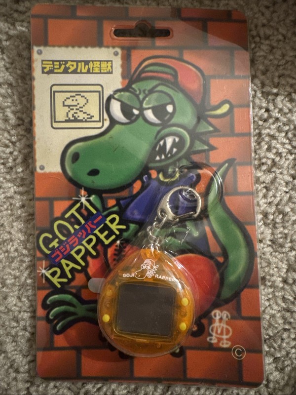 Goji Rapper Handheld LCD Virtual Pet game from Japan (Tamagotchi type toy)