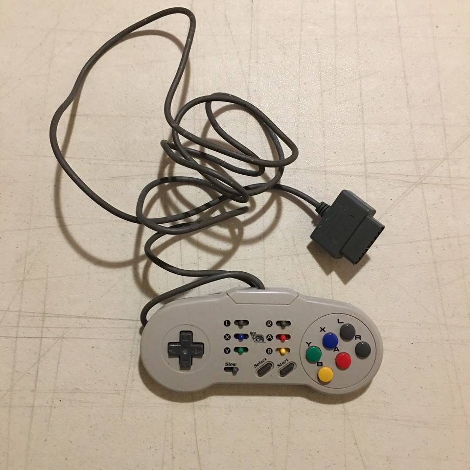 A genuine 1990s SNES controller with Blockbuster Video branding — a double-dose of 90s nostalgia in one object.