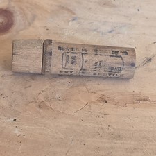  Vintage wooden needle holder w/ 2 needles. 