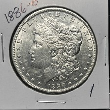 1886-O MORGAN SILVER DOLLAR, AU DETAILS