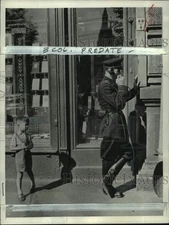 1955 Press Photo Little boy watches policeman in Moscow, Russia - pix00342