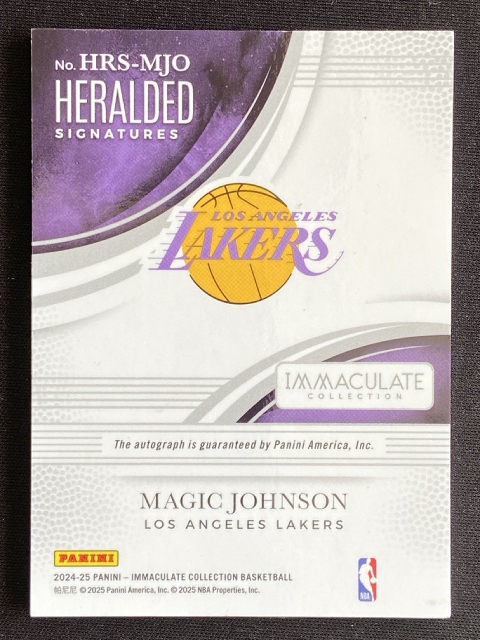 Magic Johnson 2024-25 Panini Immaculate Collection Heralded Auto /99 #HRS-MJO view 2