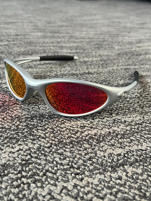 Oakley Minute 1.0: Silver Wrap Sunglasses With Fire Iridium Lens