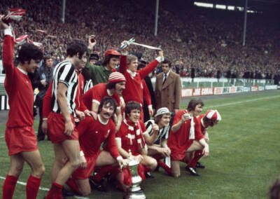 Liverpool celebrate with the trophy after winning the FA Cup final- Old Photo