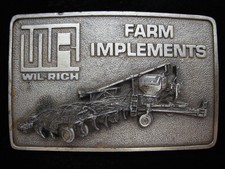 PC11111 VINTAGE 1981  WIL-RICH FARM IMPLEMENTS  TRACTOR PEWTER BELT BUCKLE