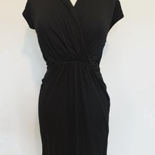 Kenneth Cole black wrap dress with sheer hem. Size M preppy chic work trendy