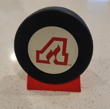 Angled Hockey Puck Display Stand - Fire Engine Red