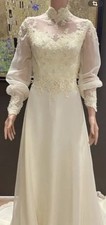 Vintage 1960s to 1970s Edwardian-revival lace wedding gown with Train