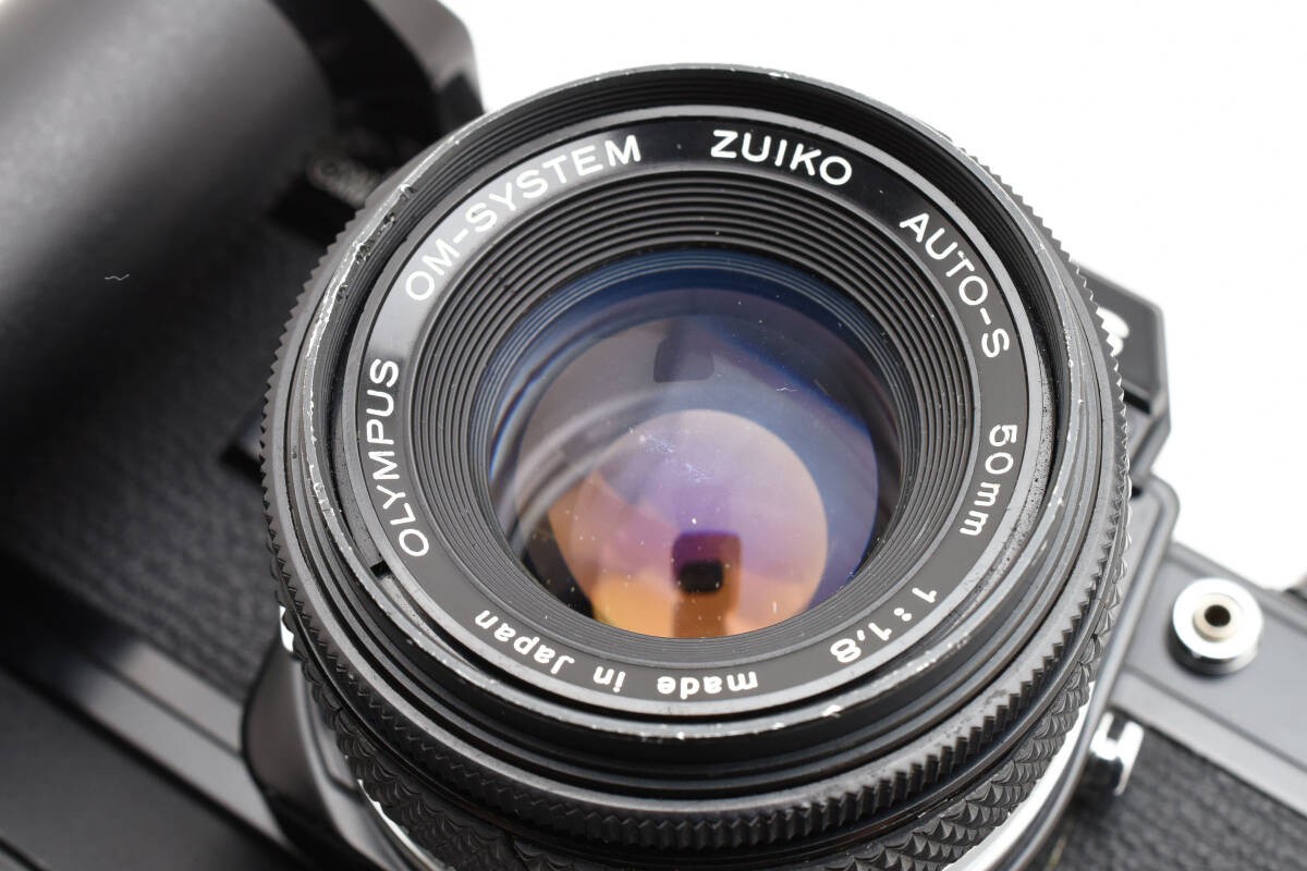 Olympus OM10 + WINDER2 + 50mm F1.8 Olympus OM-10 (black) with 50mm