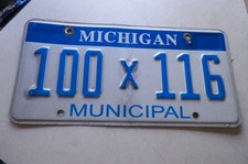 used Michigan municipal aluminum license plat...