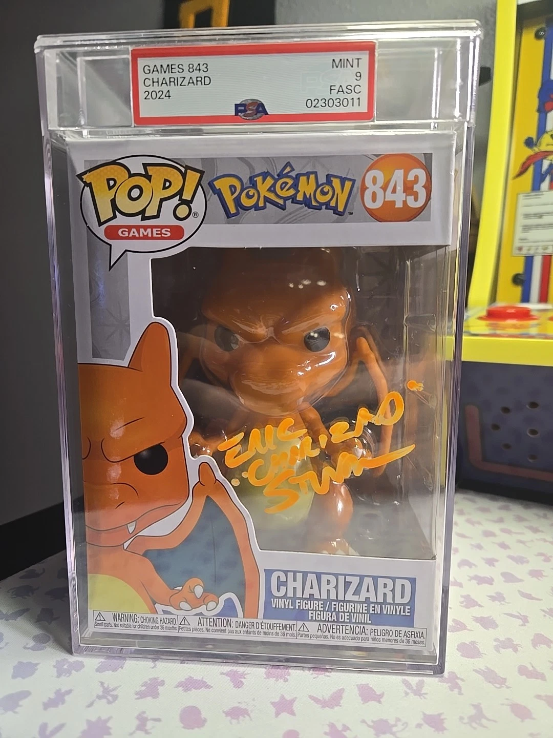PSA Graded 9 Charizard Funko Pop Signed By Eric Stuart