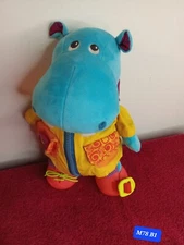 Hank the hippo laughs and wiggles is learning to get dressed