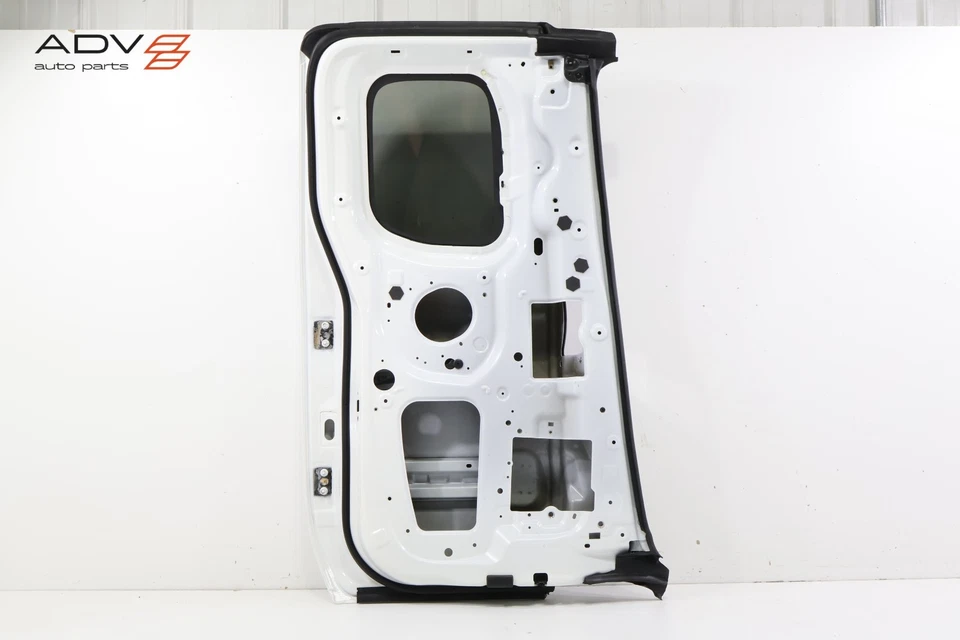 Nissan Frontier 2022-2025 cabina extendida puerta trasera izquierda panel carcasa OEM Foto 2 de 4