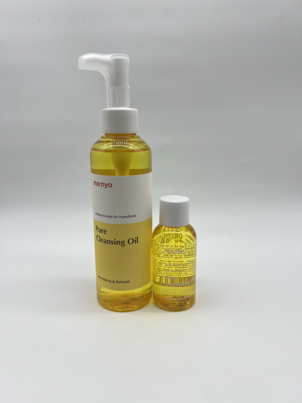 Ma:nyo Pure Korean Facial Cleansing Oil, 1x6.7 fl oz Bottle, 1x1.8 fl oz.