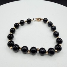 Black Glass Bead Necklace Gold Tone Filigree Clasp Graduated Statement Jewelry