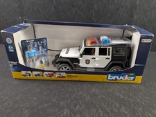Bruder Toys 02526 Jeep Wrangler Police Vehicle With Policeman & Accessories