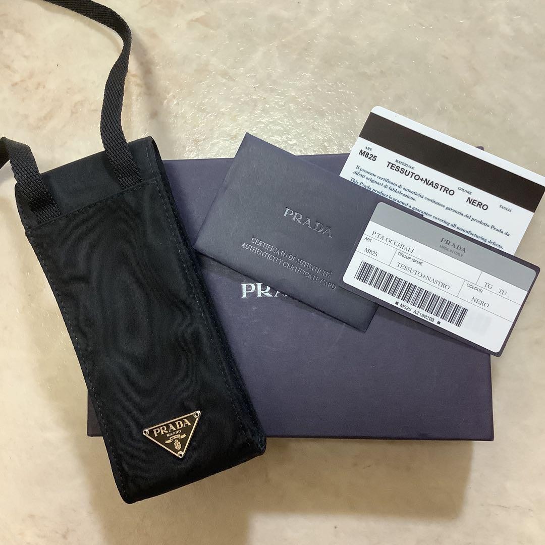 Prada black nylon shoulder pouch with triangular logo plate from Japan