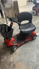 Red 4-Wheeled Mobility Scooter with Basket for Indoor and Outdoor Use