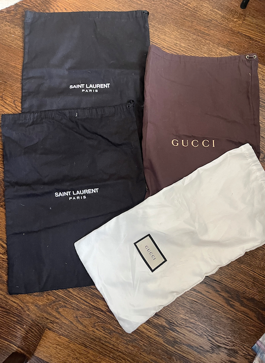 Sacchetti antipolvere Saint Laurent e Gucci