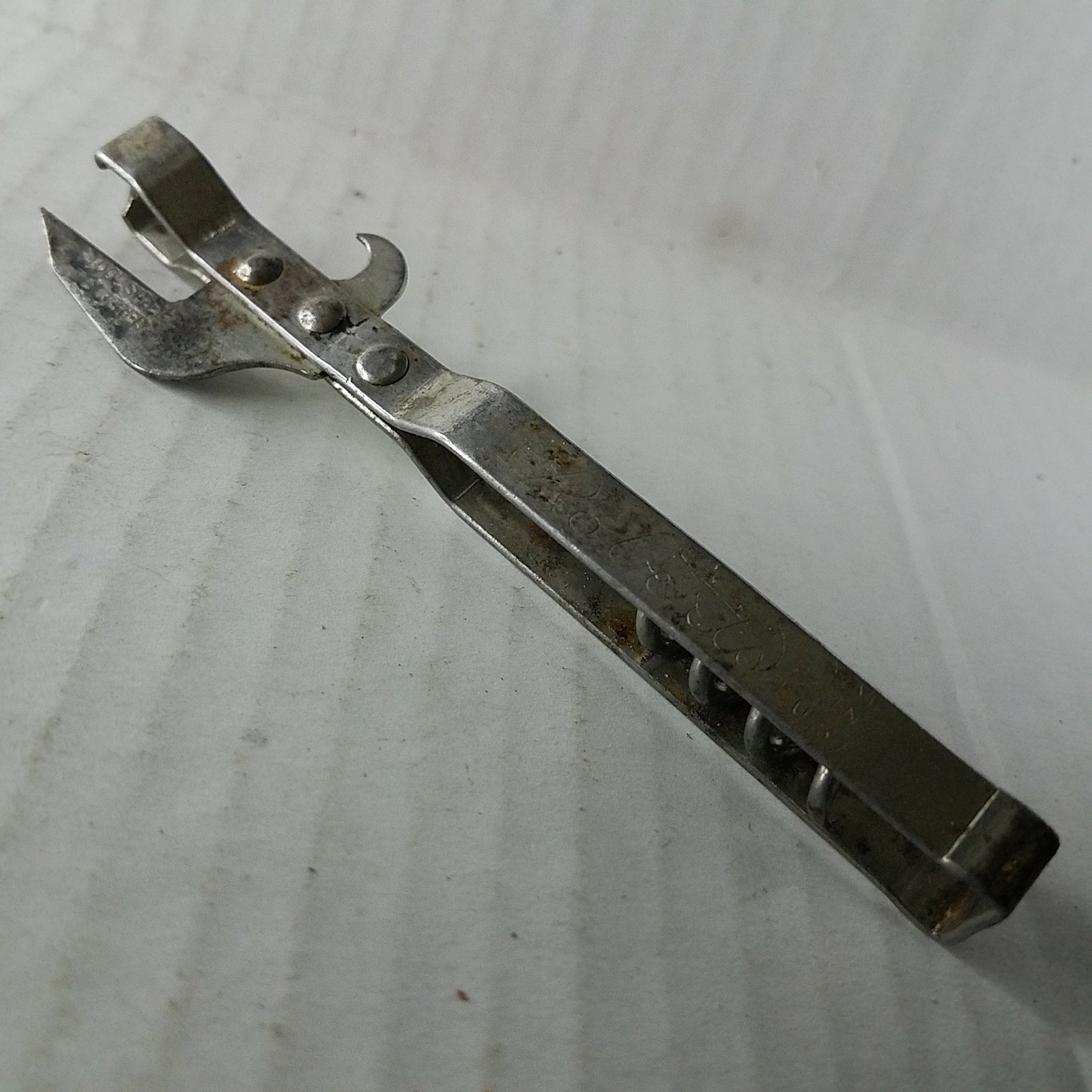 Vintage Roberts Multi-Tool with Bottle Opener, Can Opener, and Corkscrew  