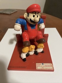 vintage nintendo collectibles 1980s Nes action figures and Nintendo Power guides