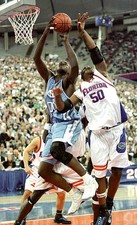 North Carolina center Brendan Haywood grabs a rebound from Udonis - Old Photo