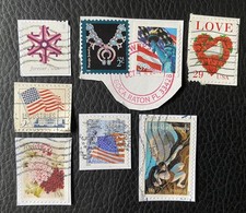Lot de 8 timbres des USA années diverses - encore sur fragment - L46