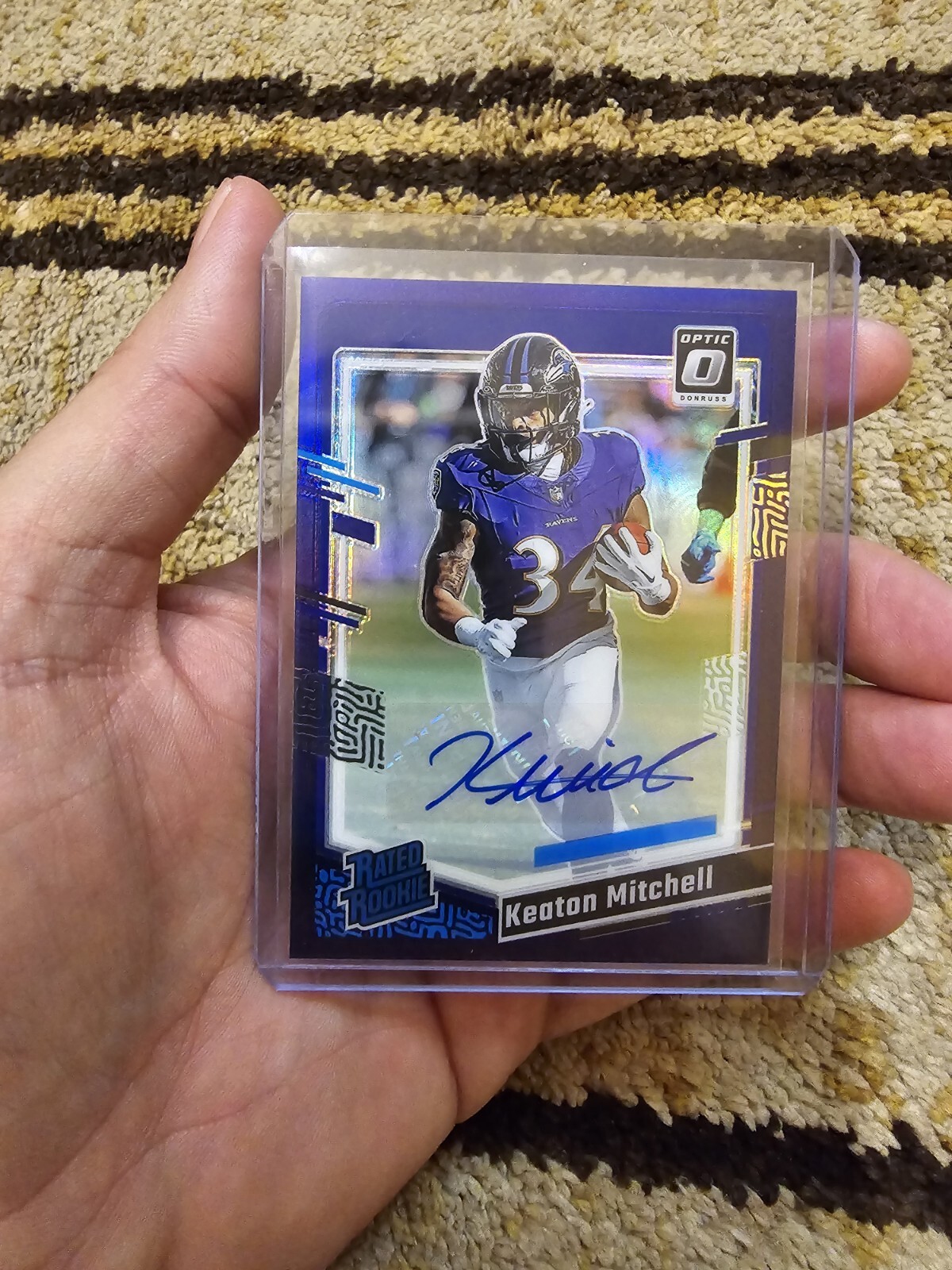 2023 Donruss Optic Rated Rookie Purple Auto #207 Keaton Mitchell /35