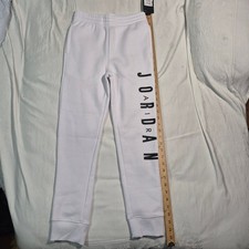 BOYS MEDIUM NIKE AIR JORDAN SWEATPANTS WHITE WITH BLACK LOGO