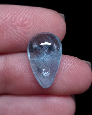 Natural Blue Aquamarine cabochon with silver inclusions and rainbow 15x9 mm