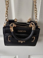 Bebe black leather handbag with crossbody strap Gold Accents